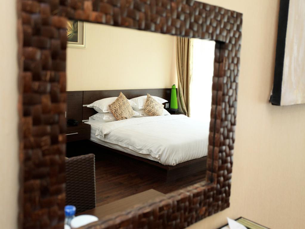 เดวาตาสวีทแอนด์เรสซิเดนซ์ Hotel เลอกีอัน ห้อง รูปภาพ